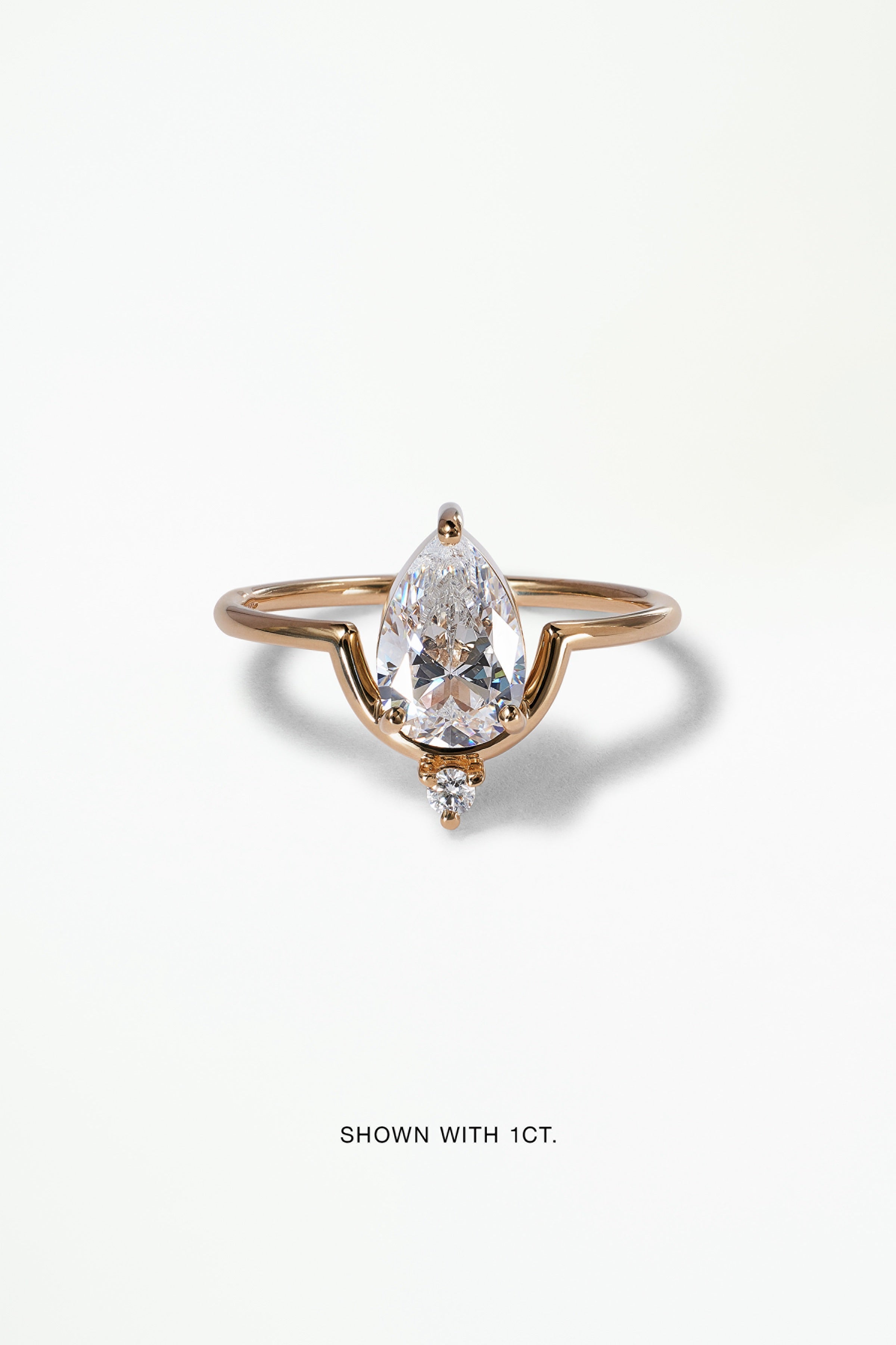 Pear Brilliant Cut Diamond Nestled Ring – WWAKE