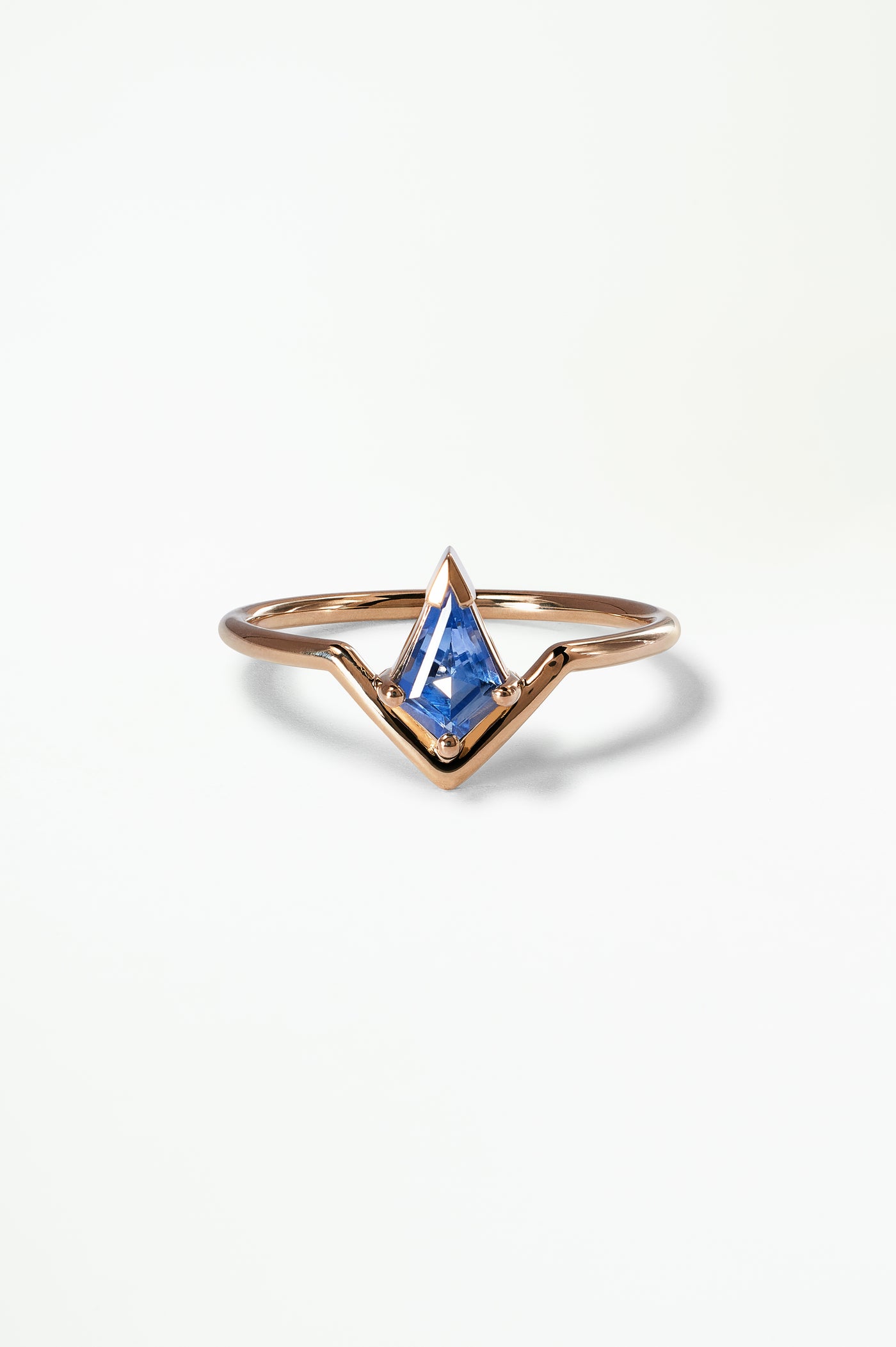 Kite Cut Blue Sapphire Nestled Ring