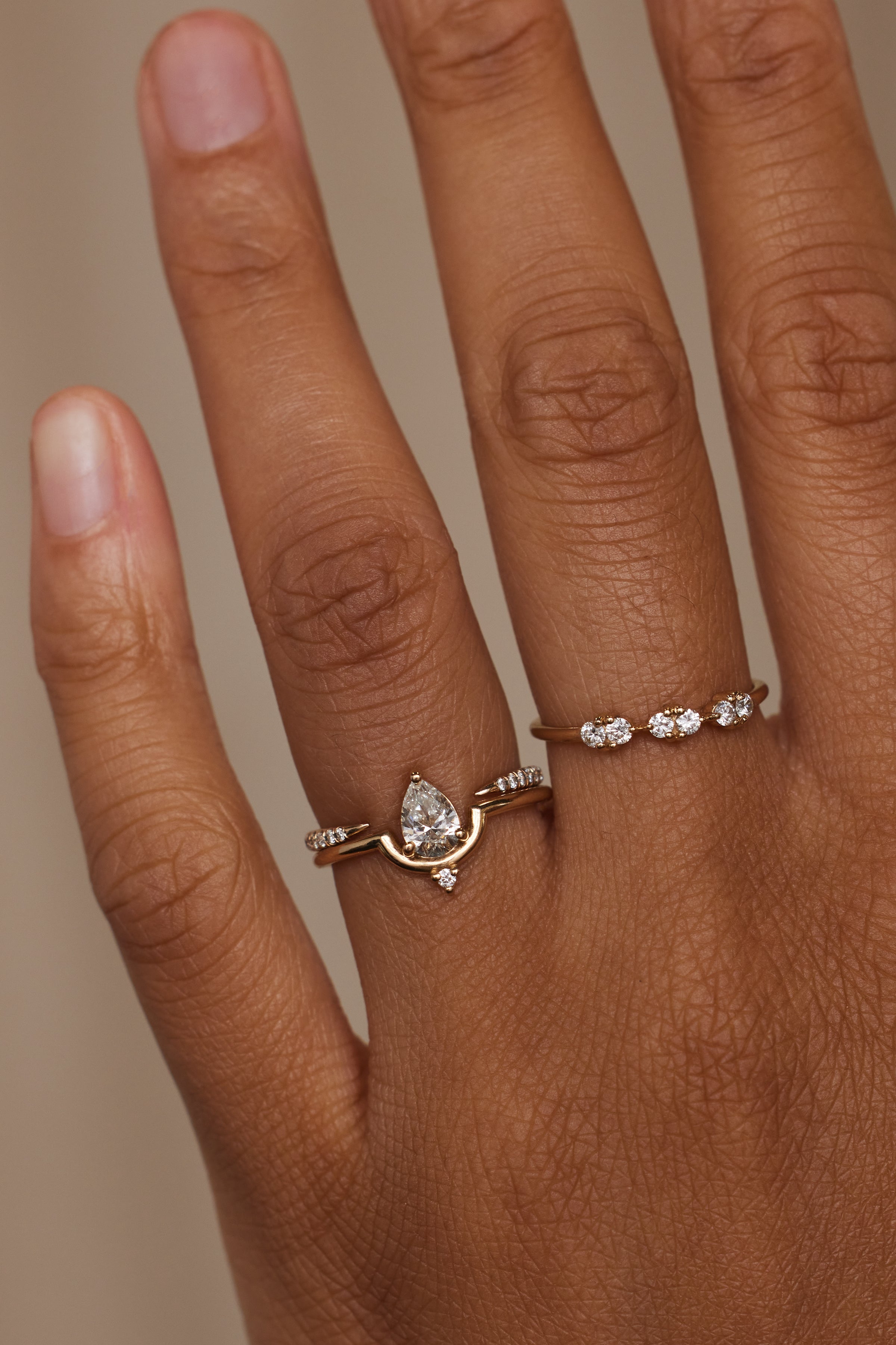 Small pear shop diamond ring