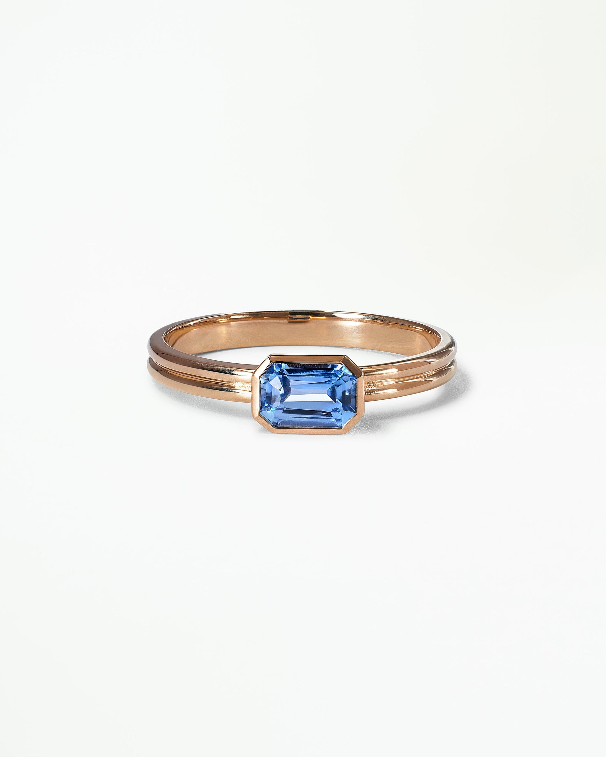Emerald Cut Blue Sapphire Ridge Solitaire Ring