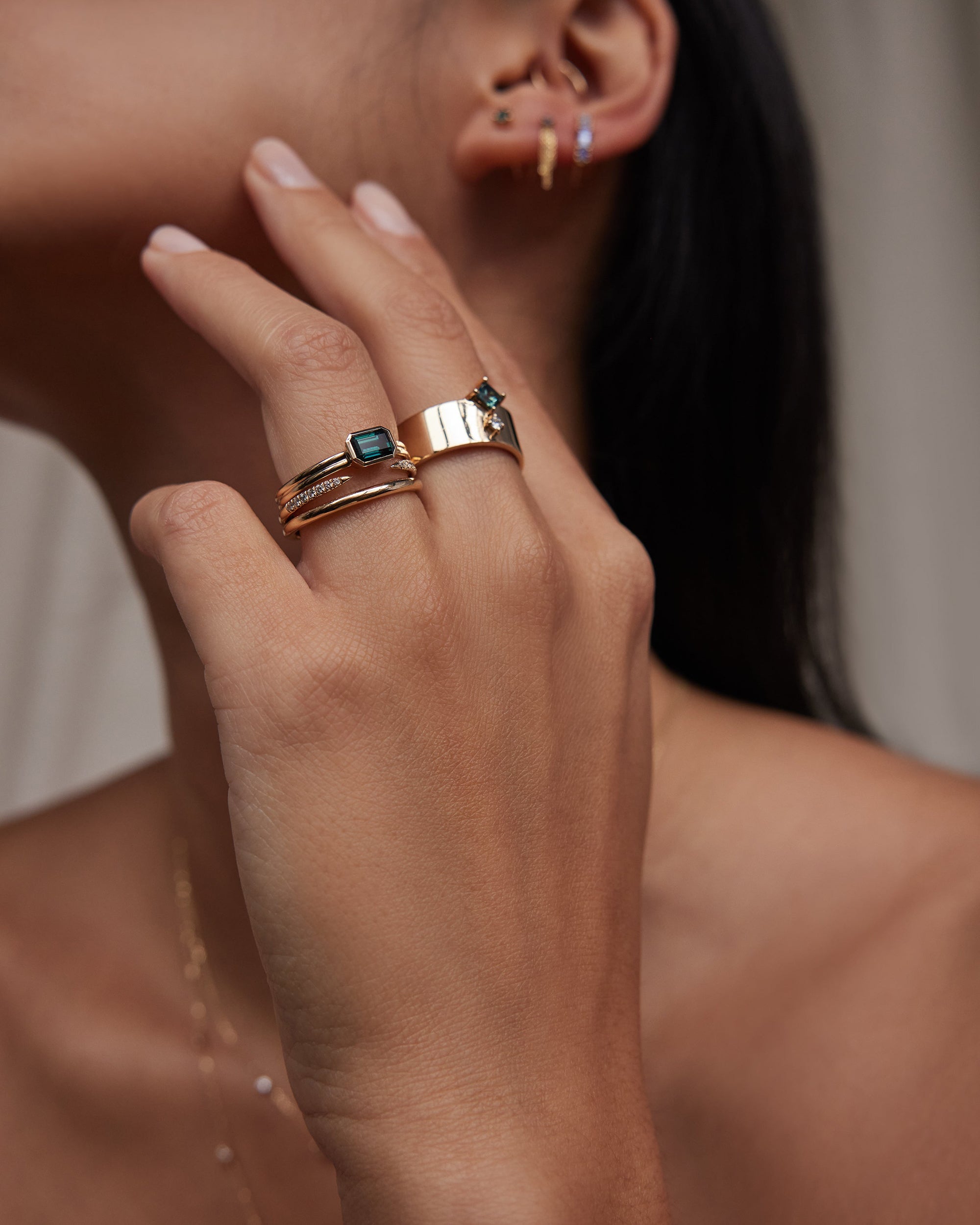 Emerald Cut Teal Sapphire Ridge Solitaire Ring