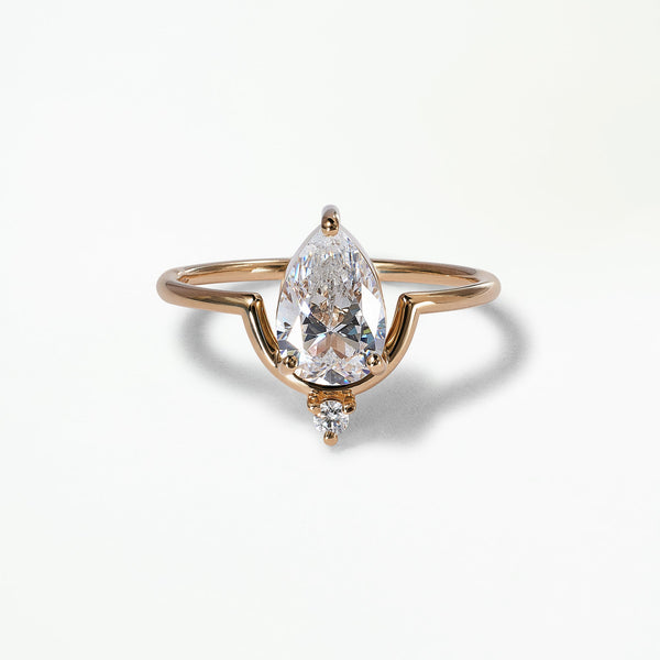 Pear Cut Diamond Nestled Ring