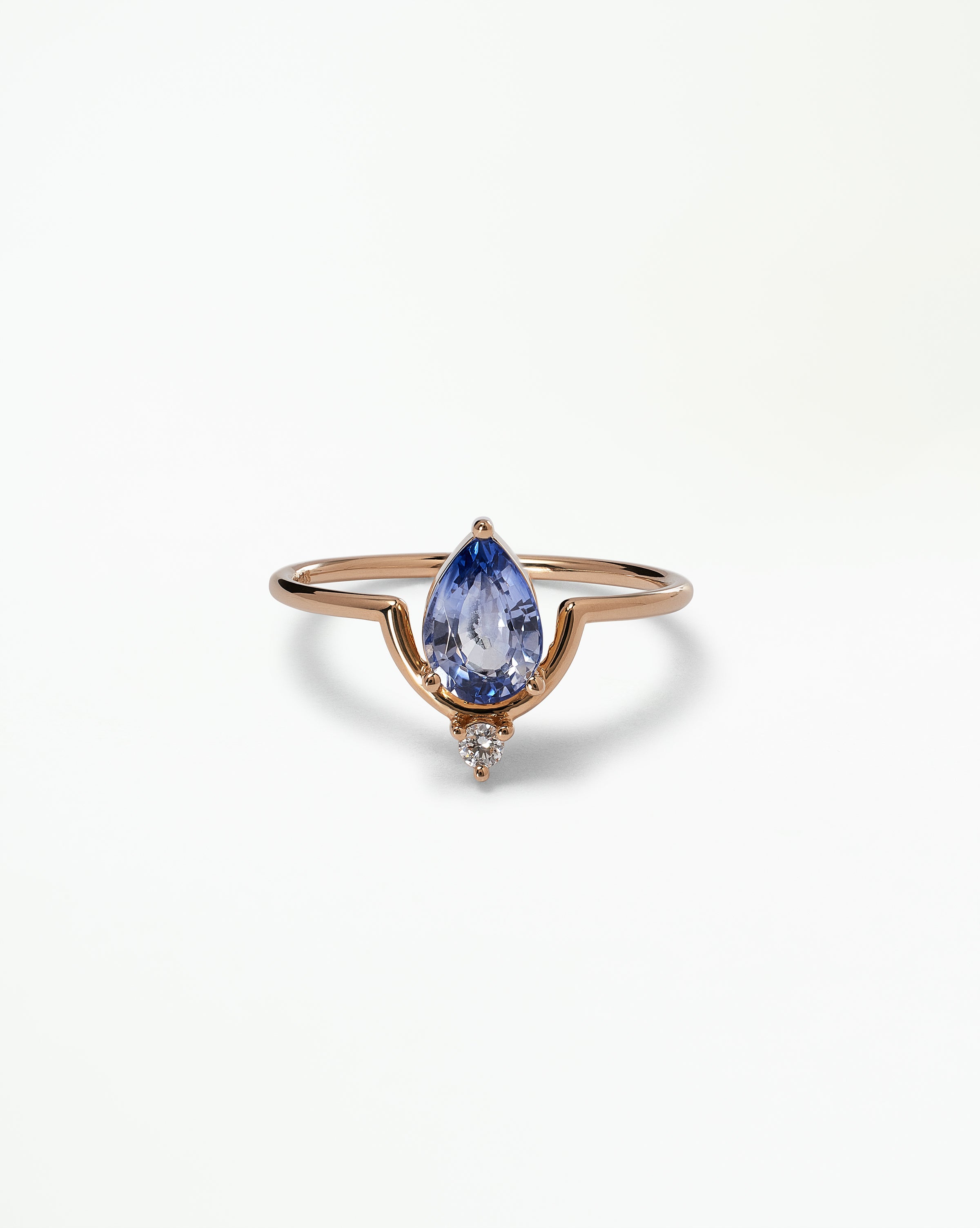 Pear Cut Sapphire Nestled Ring
