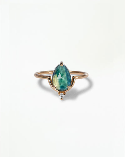 Pear Cut Sapphire Nestled Ring