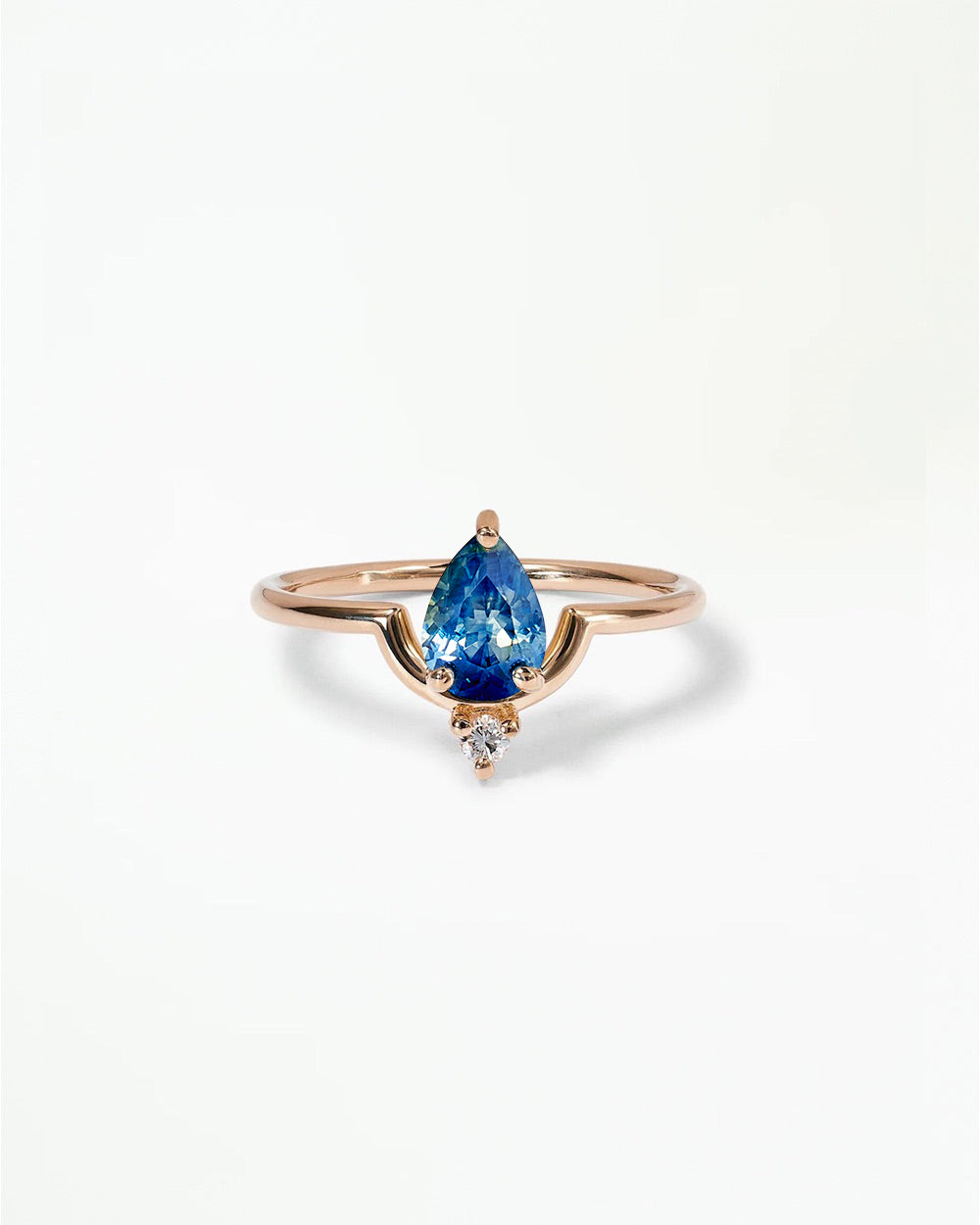 Pear Cut Sapphire Nestled Ring