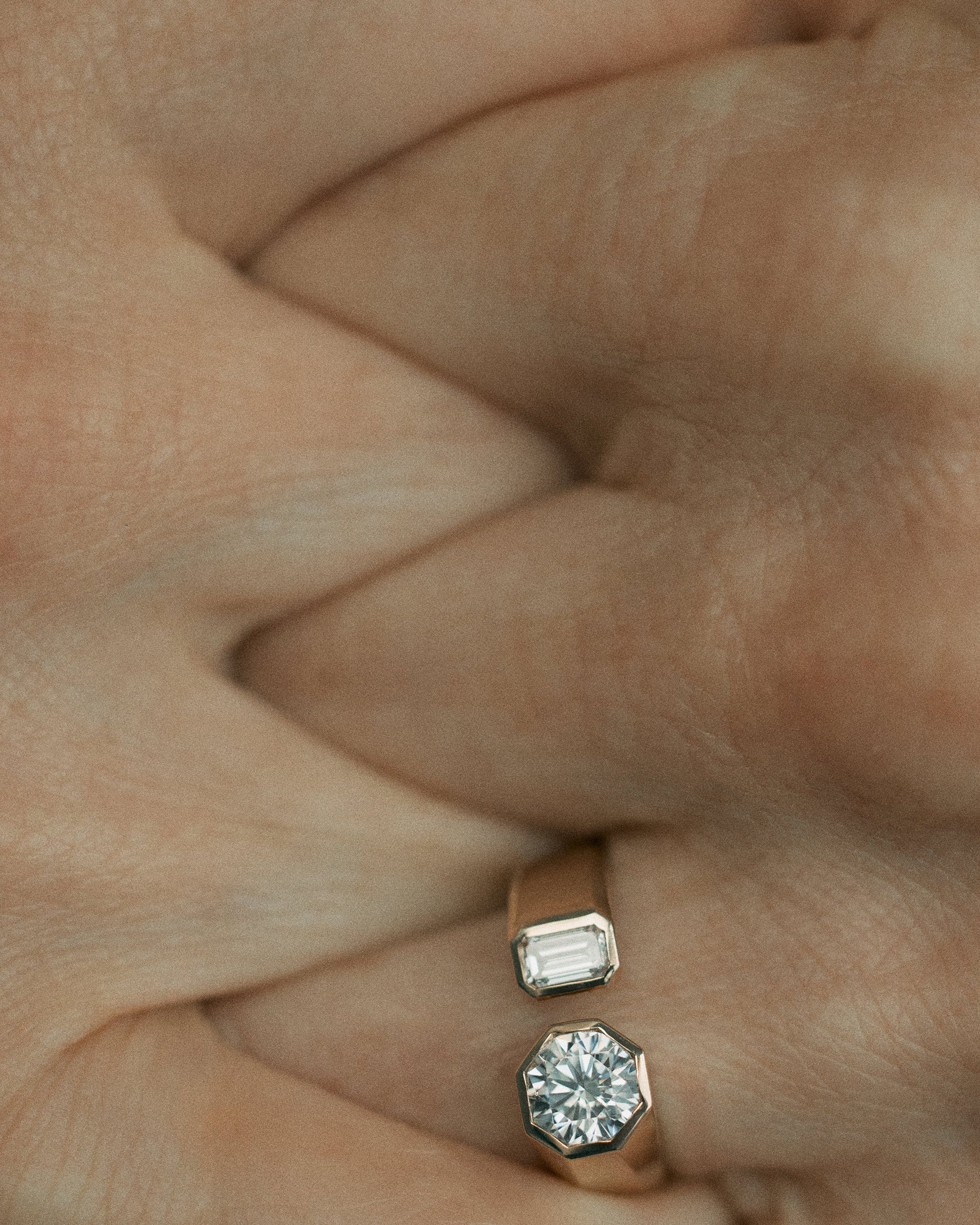 [lifestyle]Round and Emerald Cut Diamond Dyad Signet Ring