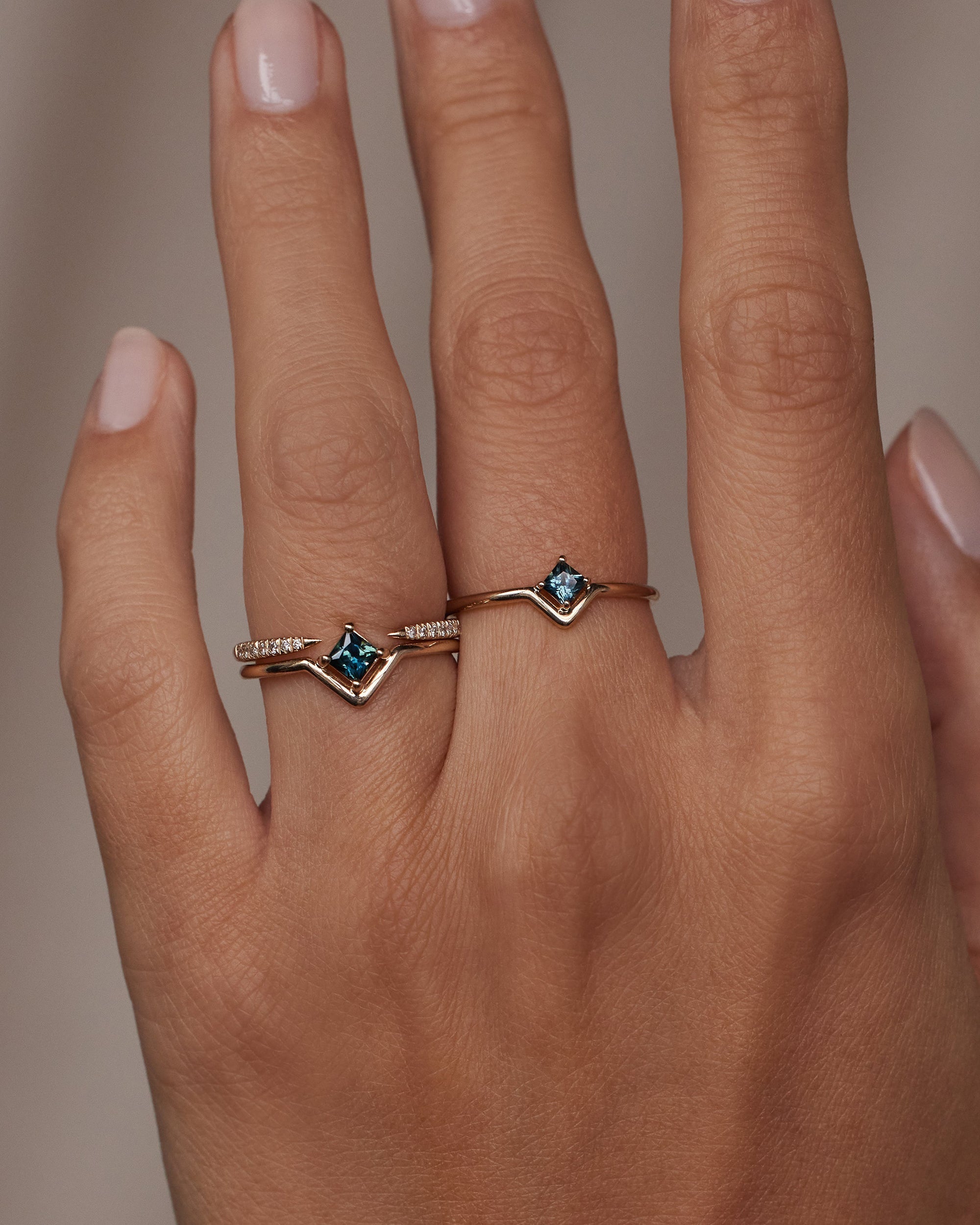 Small Princess Cut Teal Sapphire Nestled Ring