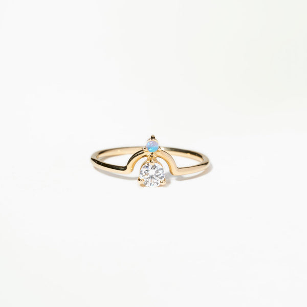 Small Round Cut Diamond and Opal Nestled Ring